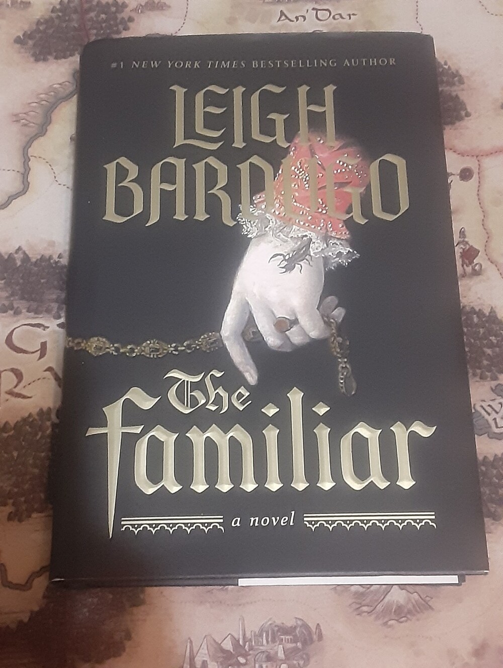 The Familar hardcover book by Leigh Bardugo.  Black sprayed edges. 1st edition =